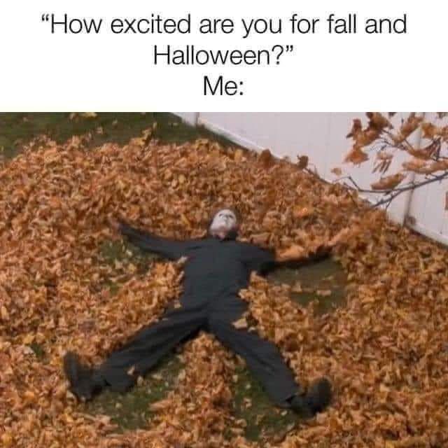 Michael Myers making a snow angel in a pile of fall leaves, about Halloween excitement.