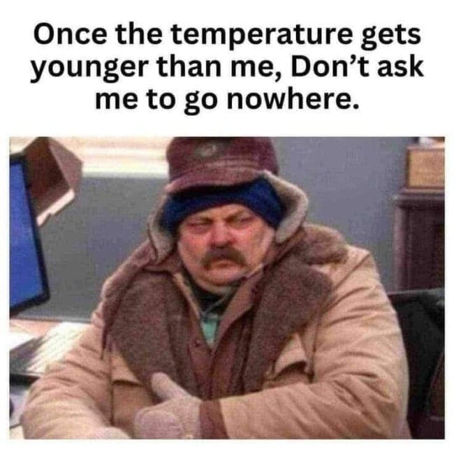 Nick Offerman as Ron Swanson bundled in winter clothes, refusing to go anywhere when cold.