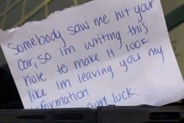 Note saying someone saw the writer hit the car, so they're pretending to leave information.