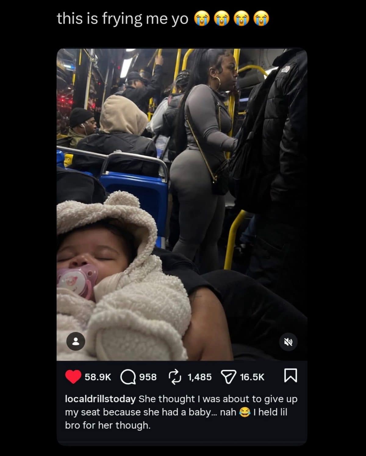Phone photo of a sleeping baby on a crowded bus, with a caption about giving up a seat.