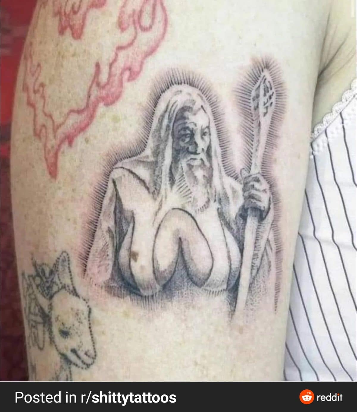 Shaky line tattoo of a bearded wizard with a staff and an unexpected chest