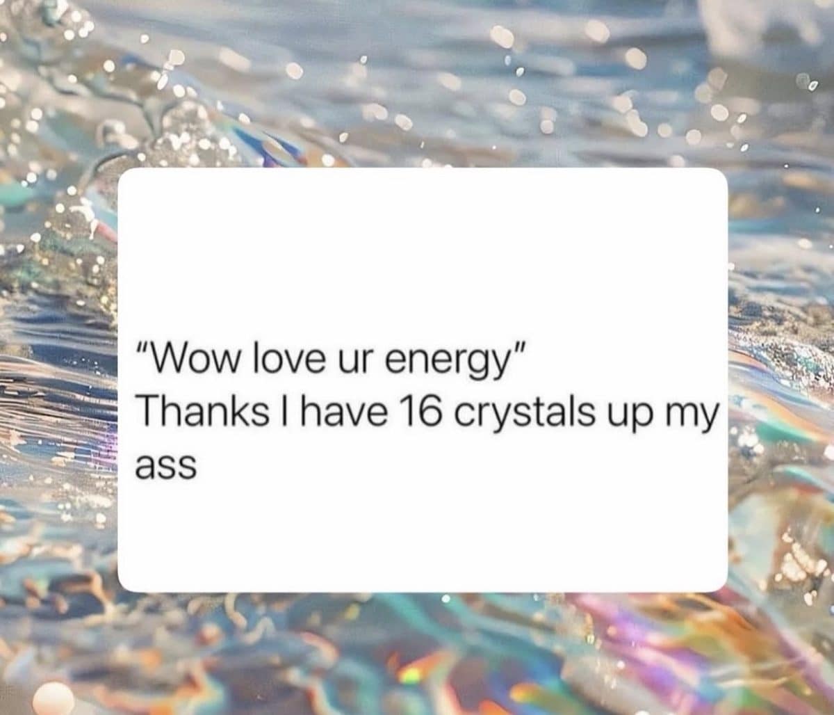 Crude text over glittering water joking about crystals and energy
