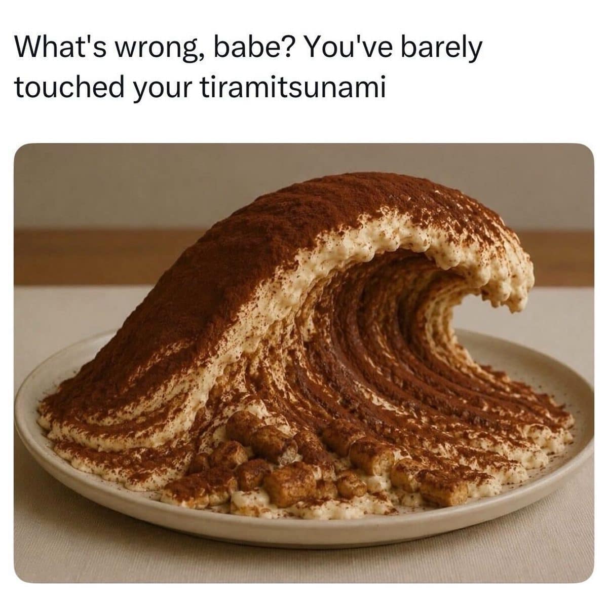 Tiramisu shaped like a giant cresting ocean wave, captioned as a tiramitsunami.