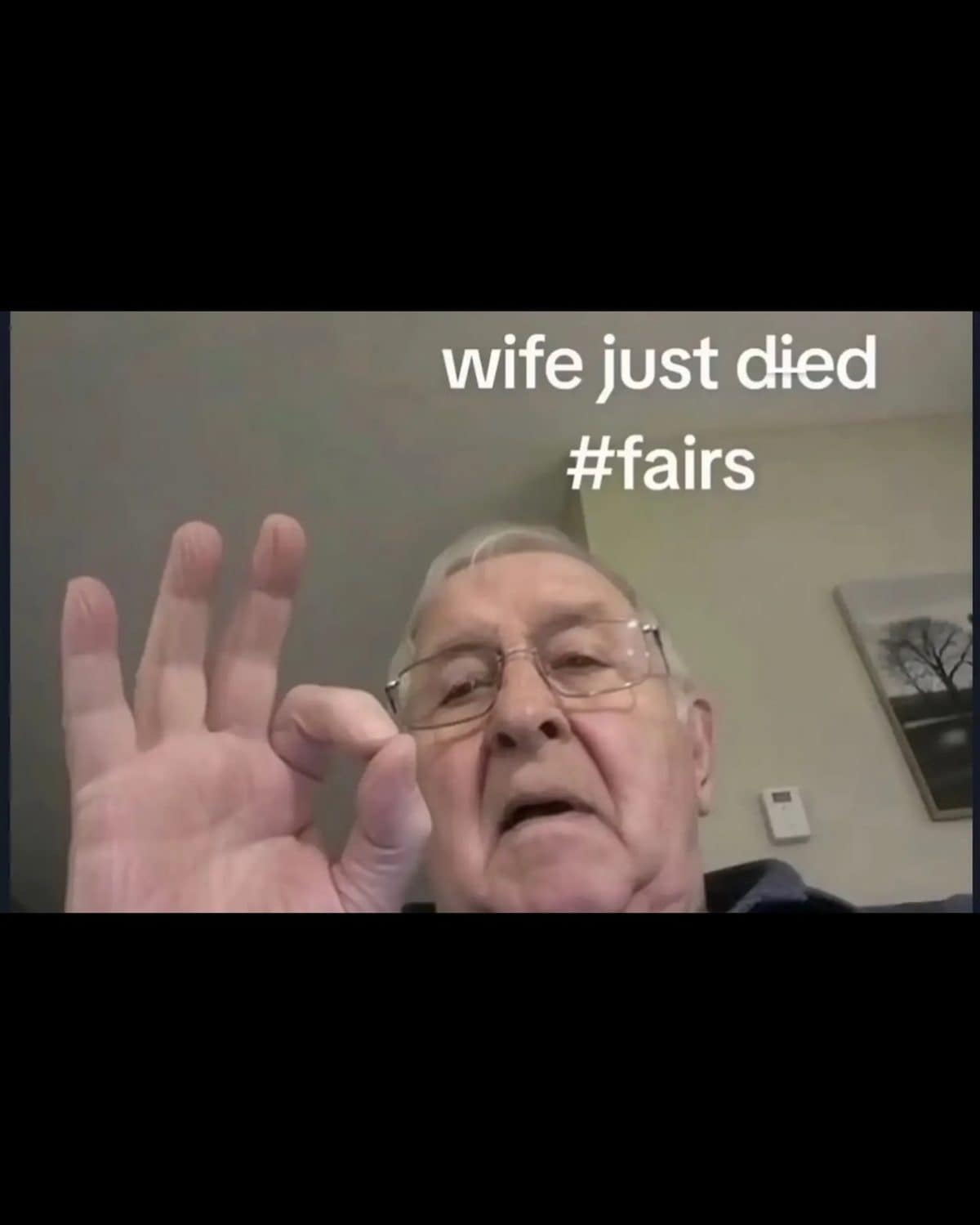Older man making an OK sign at the camera beneath a dark joke caption.