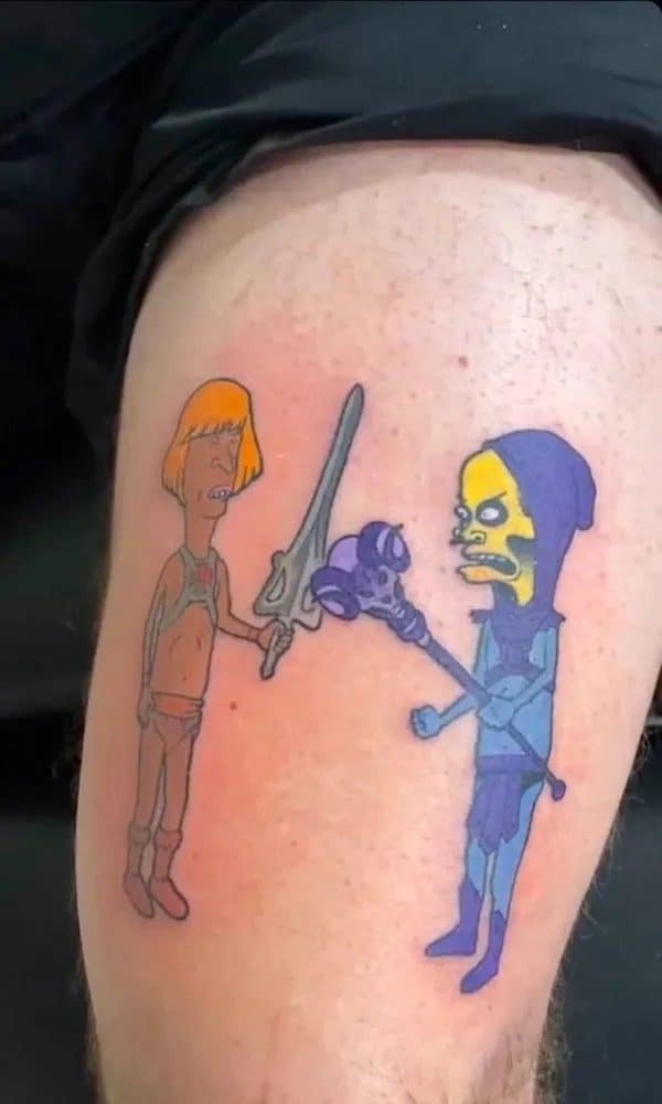 Tattoo of Beavis and Butt-Head drawn as He-Man and Skeletor facing off.