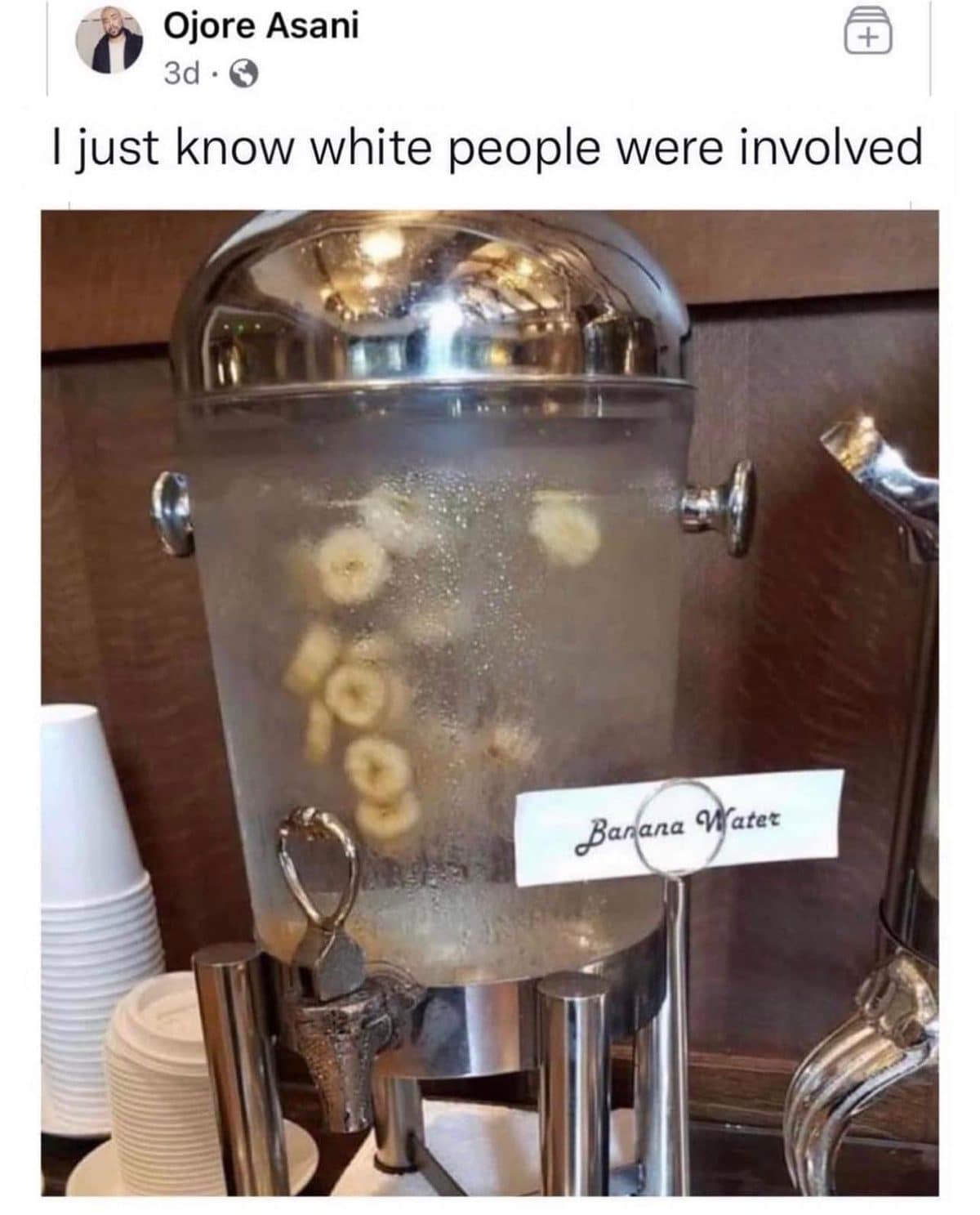 Drink dispenser labeled Banana Water with sliced bananas floating inside, a meme dump favorite.