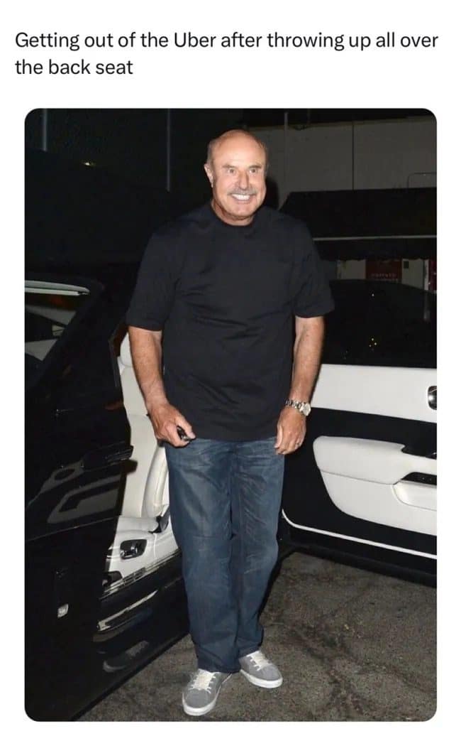 Dr. Phil grinning beside an open car door, captioned as leaving an Uber after throwing up.