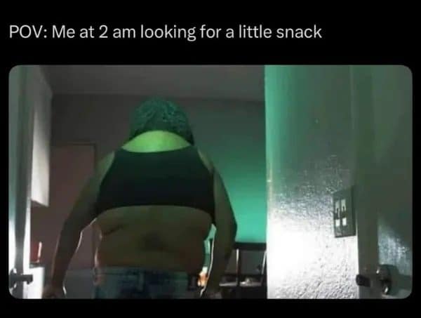 Person in eerie green light entering a dark room, captioned as a 2am snack hunt.
