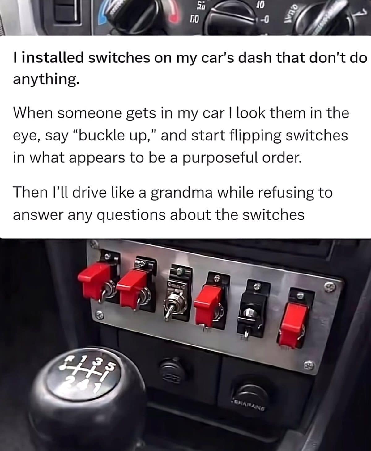 Car dashboard with a row of red toggle switches installed purely to confuse passengers