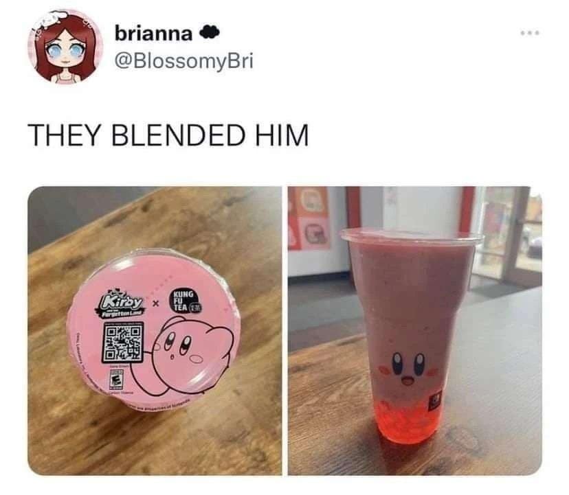 Pink Kirby smoothie cup from a tea shop with the character's face printed on it.