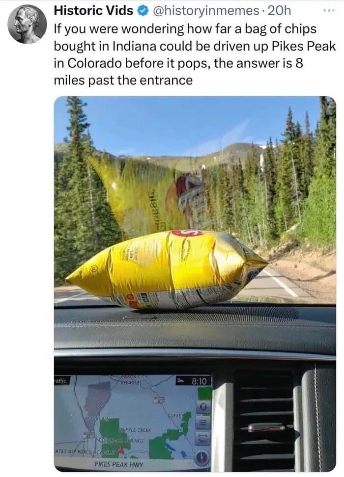 Chip bag ballooning on a car dashboard near Pikes Peak in this meme dump.