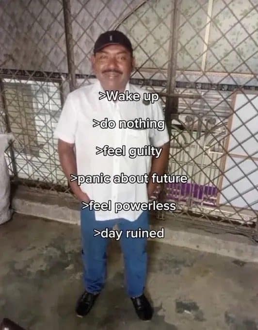 Smiling man in a white shirt over a list: wake up, do nothing, feel guilty, day ruined.