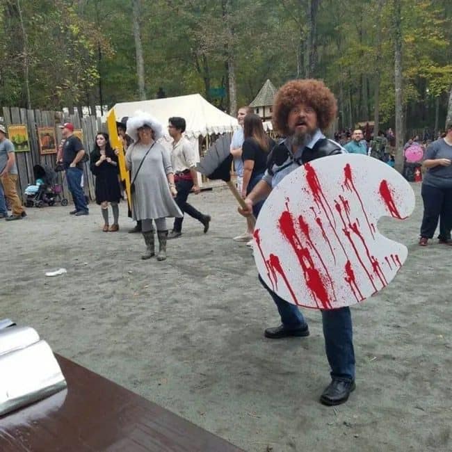 Man dressed as Bob Ross carrying a blood splattered paint palette at a fair, closing this meme dump.