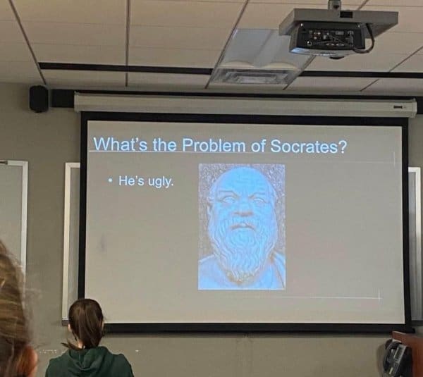 Lecture slide asking what the problem of Socrates is, answered simply with he's ugly.