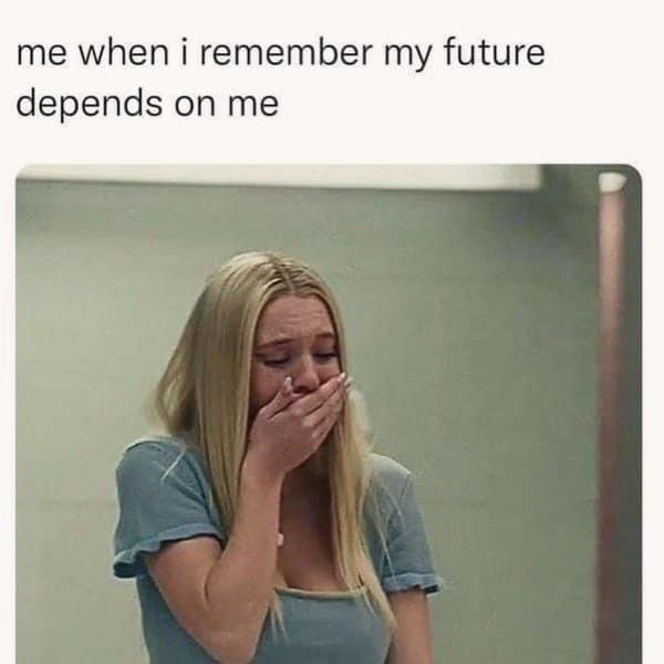 Young woman crying into her hand when she remembers her future depends on her