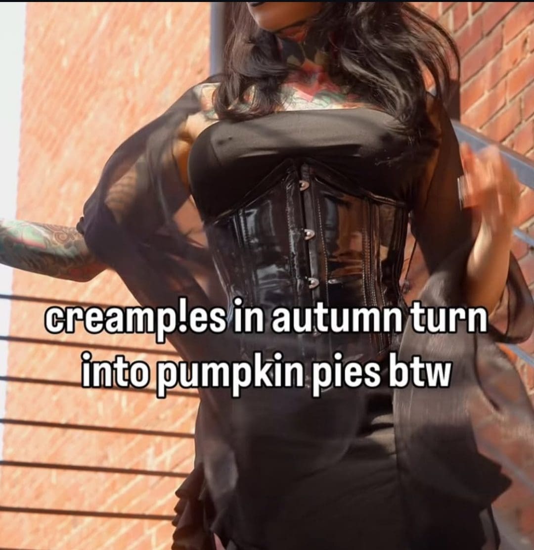 Woman in a corset with a crude autumn pie joke written across the photo.
