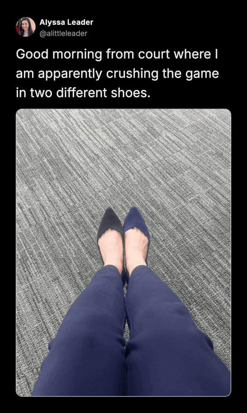 Woman at court looking down to realize she's wearing two different shoes.