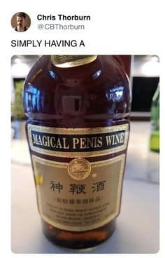Tweet showing a bottle of Chinese herbal wine with an eyebrow raising English label.