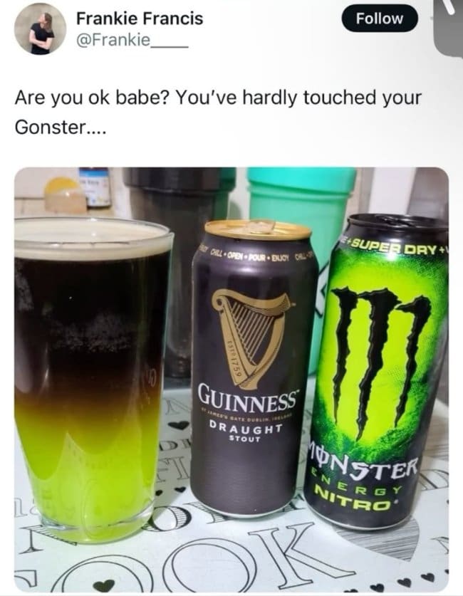 Pint glass layered with Guinness stout over green Monster energy drink, nicknamed the Gonster.