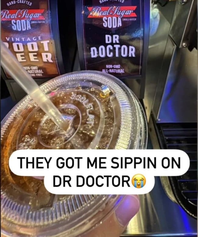 Fountain drink cup under a real sugar soda dispenser labeled Dr Doctor instead of Pepper.