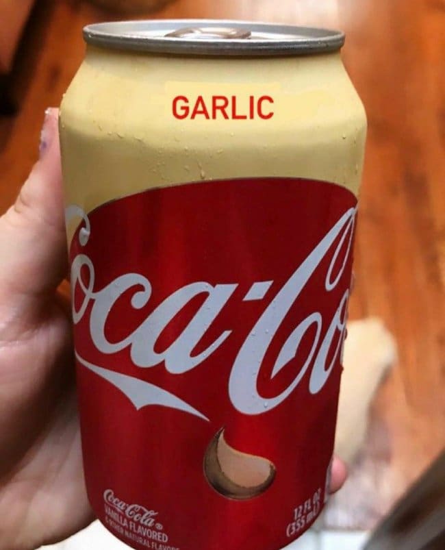 Coca-Cola vanilla can with the cream colored top relabeled garlic in bold red letters.
