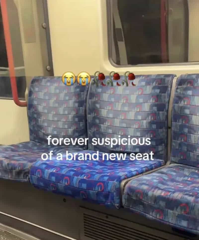 Bright new subway seat beside faded older ones, captioned forever suspicious of a brand new seat.