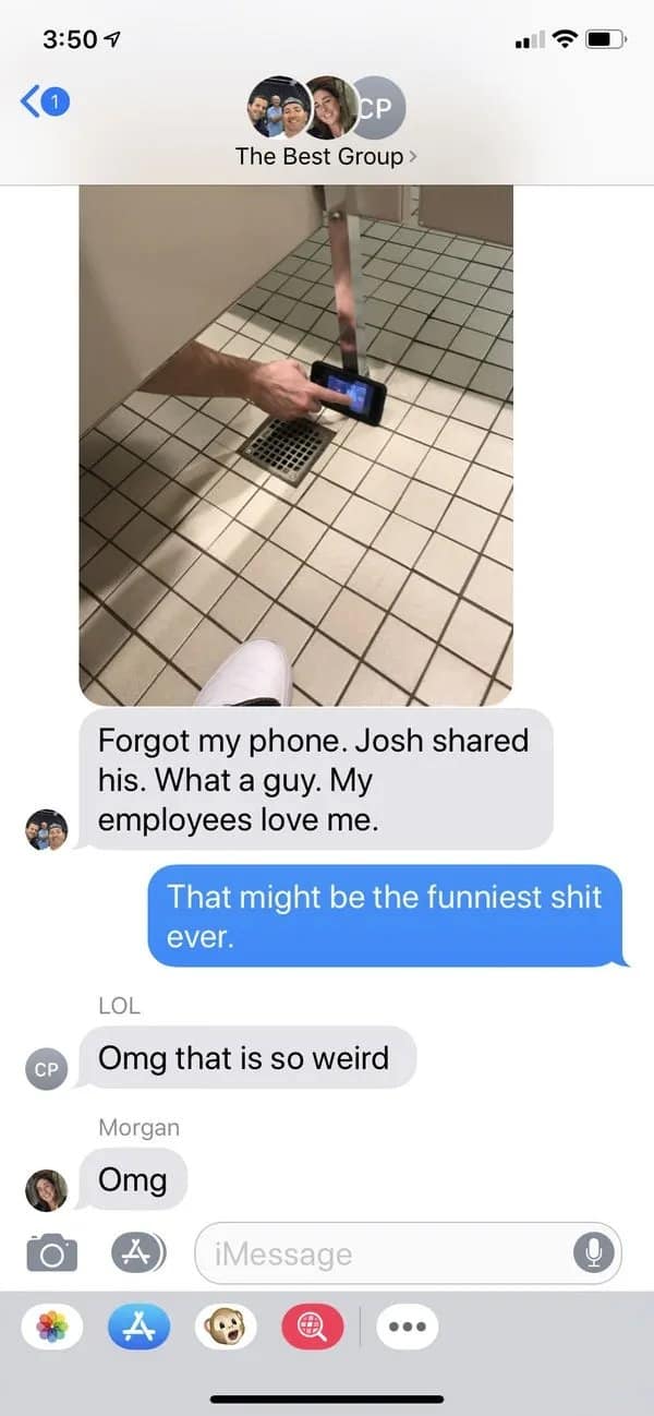 Group chat photo of a boss sharing a phone under a bathroom stall.