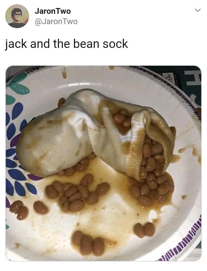 Sock filled with baked beans on a paper plate