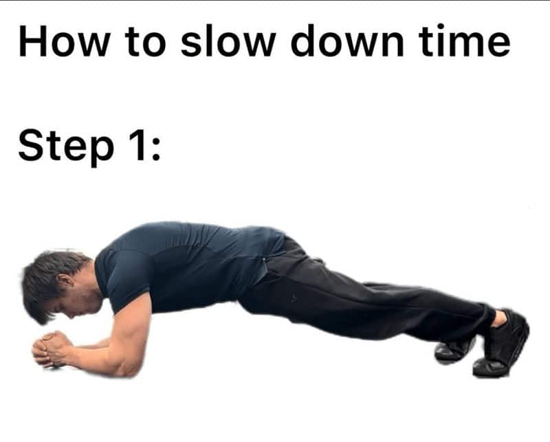 A funny exercise meme joking that holding a plank is the best way to slow down time.