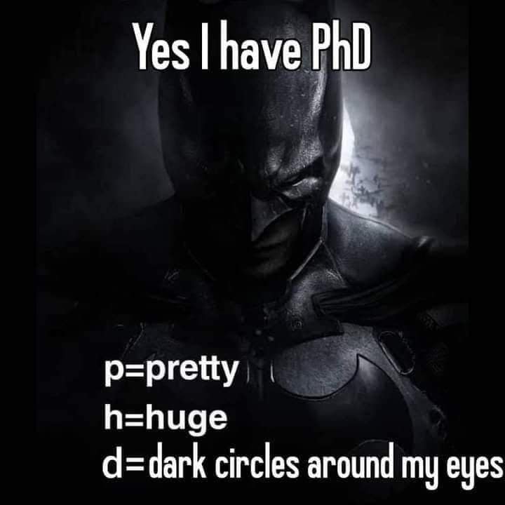 A relatable Batman meme that redefines the acronym PhD to mean "Pretty Huge Dark circles around my eyes."