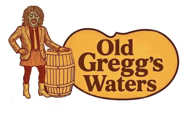 Parody label reading “Old Gregg’s Waters” with a green-skinned character beside a barrel, styled like the Cracker Barrel logo