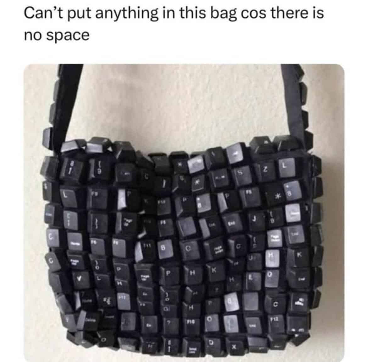 A funny pun meme of a handbag made from keyboard keys that has "no space."