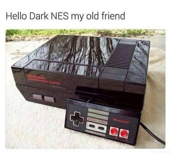 Glossy black Nintendo Entertainment System with caption: “Hello Dark NES my old friend.”