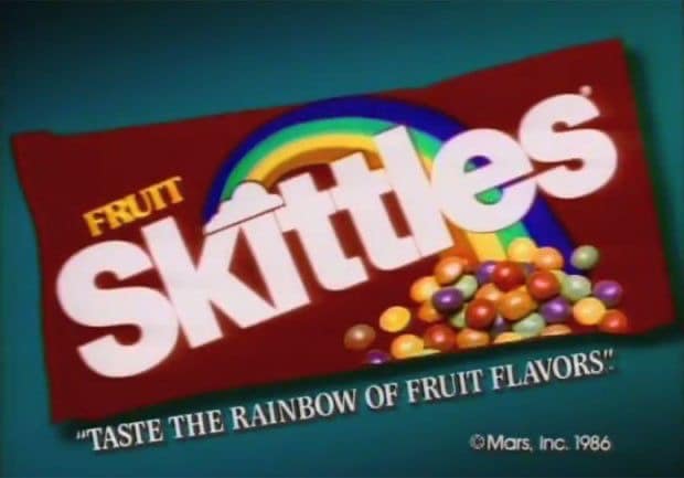 Original 1986 Skittles packaging, showcasing the classic "Taste the Rainbow" 80s candy slogan.