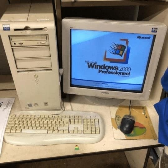Classic nostalgic pic of a beige PC tower and CRT monitor running Windows 2000