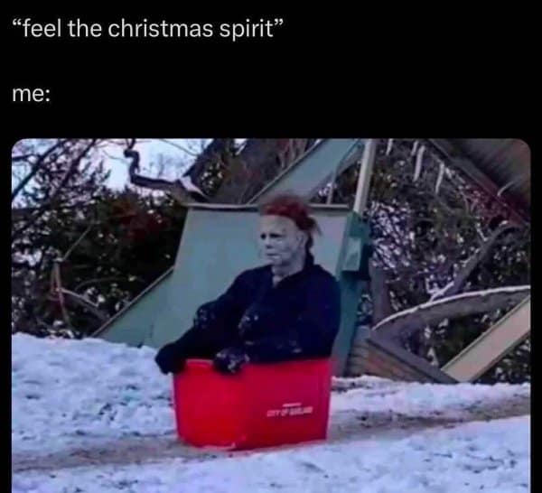 Michael Myers sledding funny meme about lacking Christmas spirit