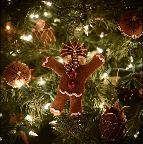Christmas tree ornament showing an Alien Facehugger on a gingerbread man