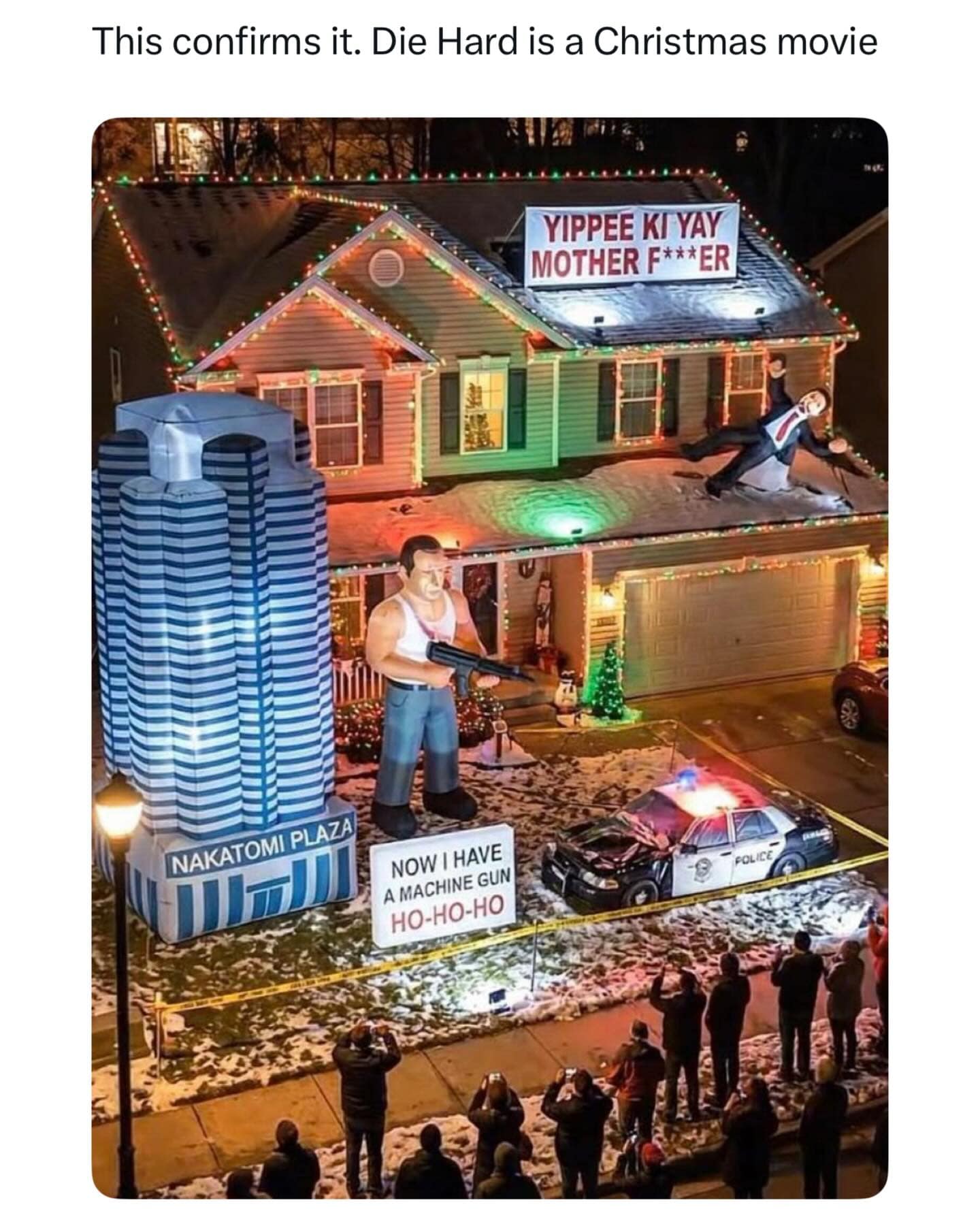 A funny meme of a house decorated with Die Hard lights including a Nakatomi Plaza tower.