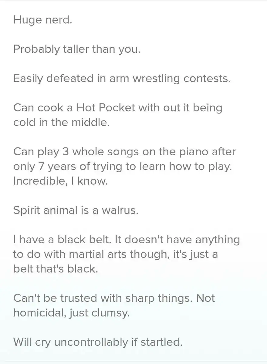 A text-based funny tinder profile bio listing traits like being easily defeated in arm wrestling and being a Hot Pocket master.