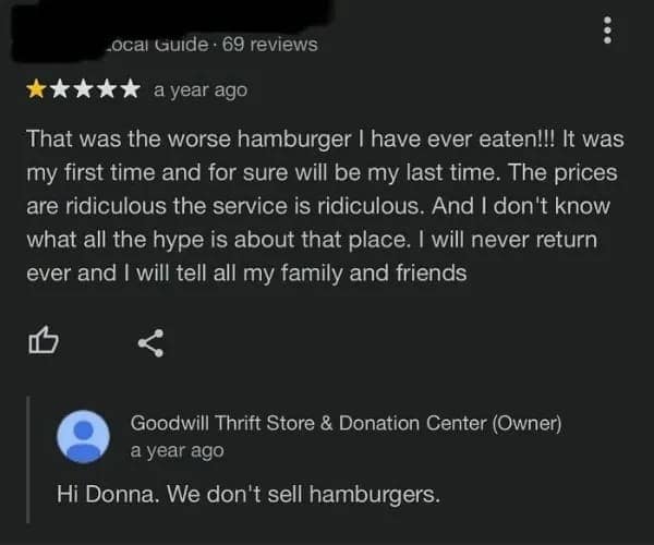 A one-star review for a Goodwill store complaining about a hamburger, showing extreme old people vs technology confusion.