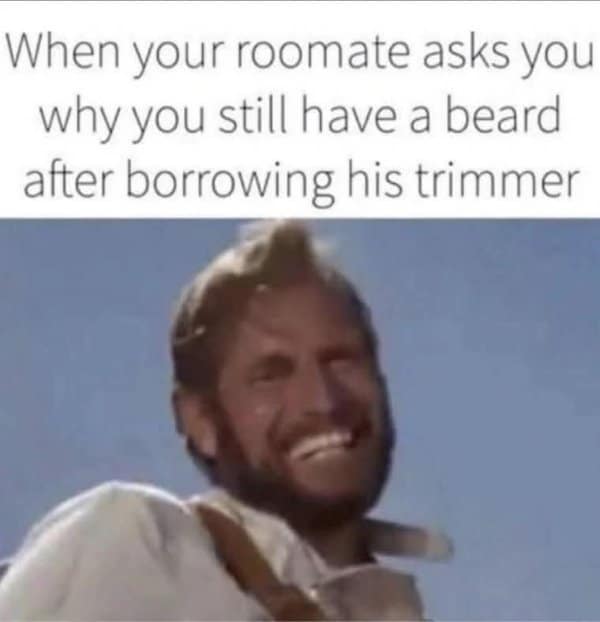 A brilliantly evil classic meme showing a rugged, bearded man laughing hysterically, representing the devious face you make when your roommate asks why you still have a beard after borrowing his hair trimmer.