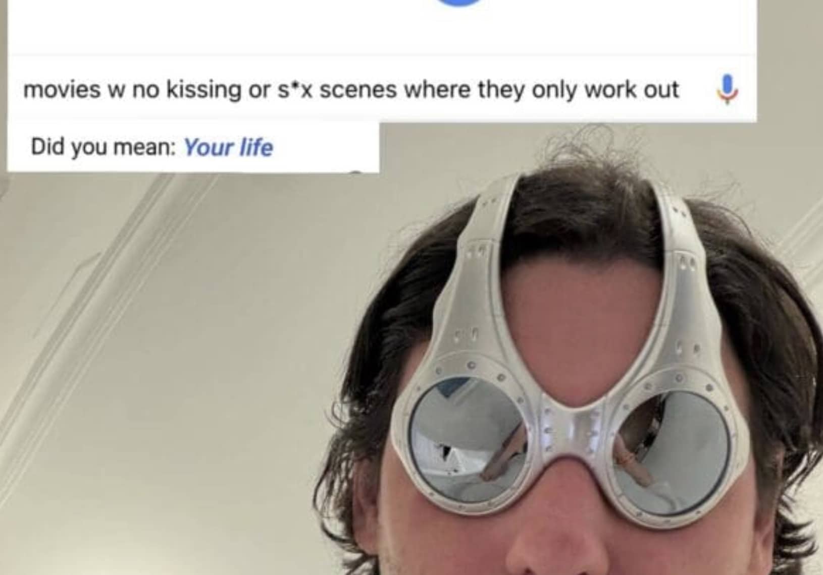 Person wearing futuristic silver Oakley Overthetop sunglasses with a search bar meme about workout movies.