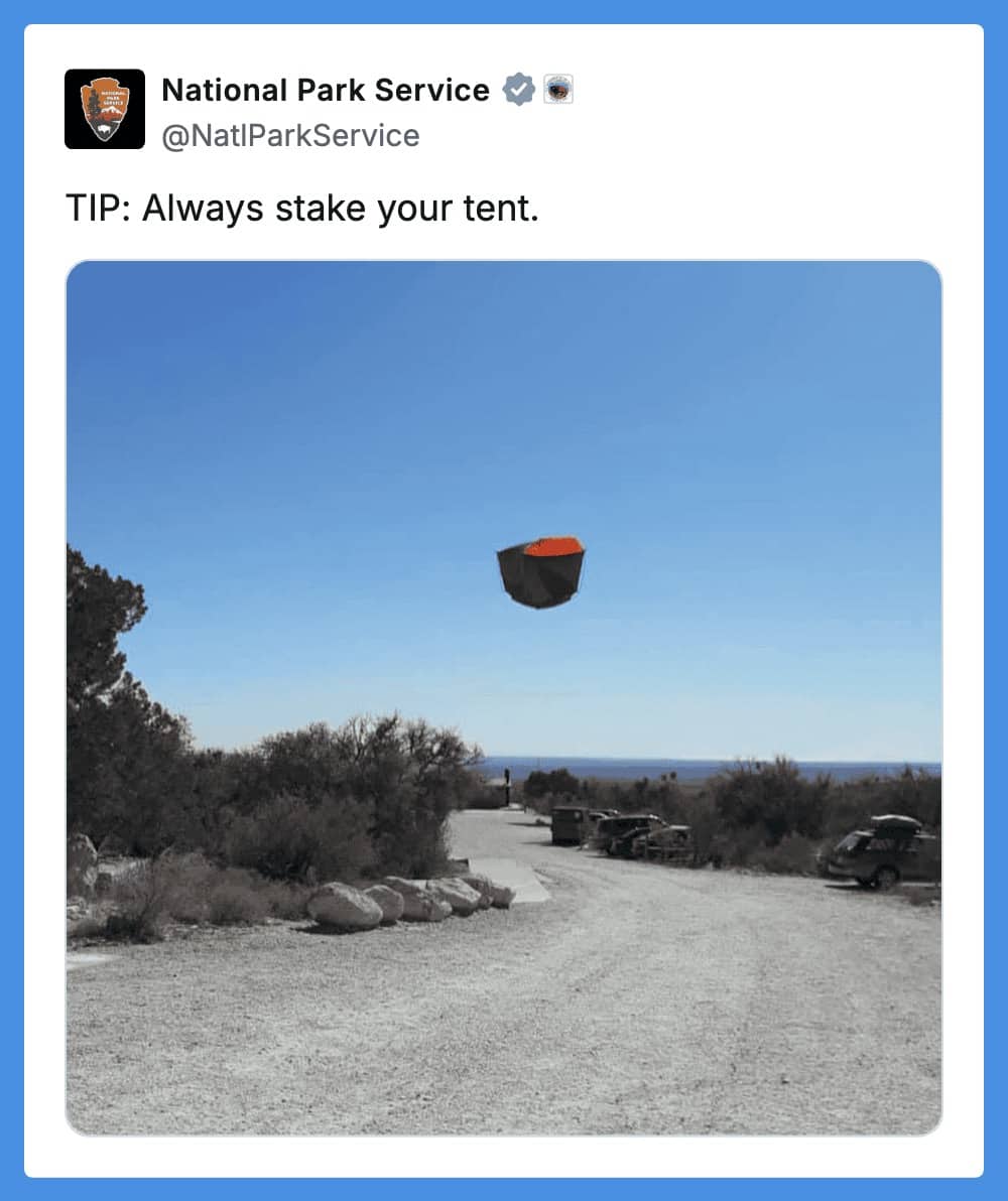 National Park Service tweet warning campers to stake tents, featuring one flying through the sky.