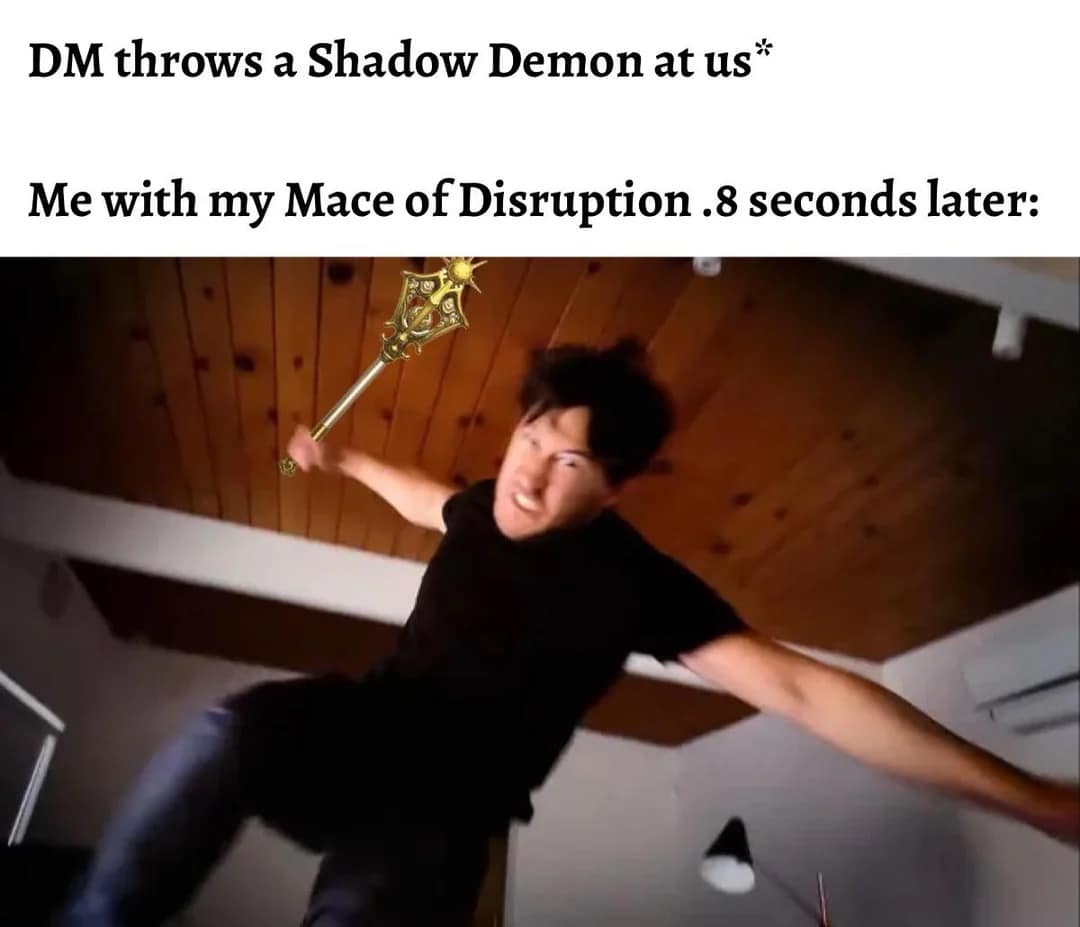 A high-energy d&d meme using a motion-blurred image of Markiplier lunging at the camera. He has been edited to hold a glowing golden Mace of Disruption, captioned: "DM throws a Shadow Demon at us / Me .8 seconds later," representing the immediate Paladin or Cleric Smite response.