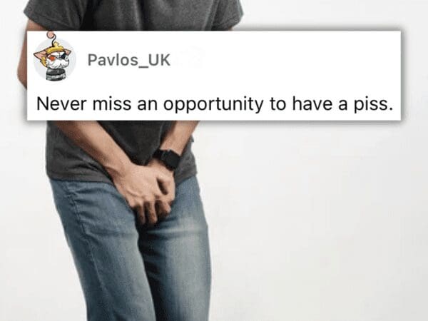 Man holding his stomach in discomfort with advice to never miss an opportunity to go to the bathroom.