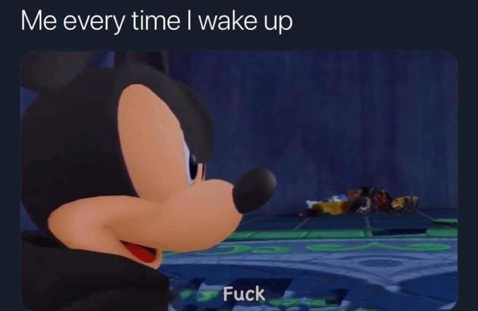 A classic meme of Mickey Mouse with a frustrated expression and the subtitle Fuck to represent morning irritation.