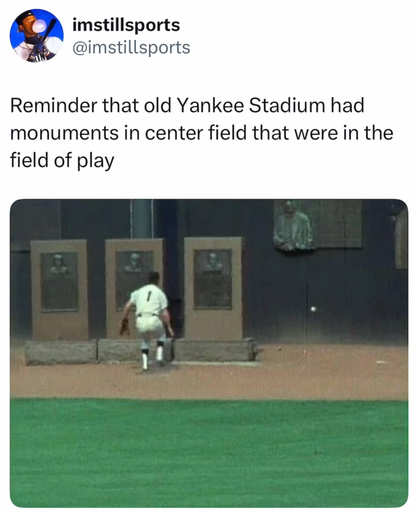 Vintage sports photo showing old Yankee Stadium monuments sitting directly inside the baseball field of play.