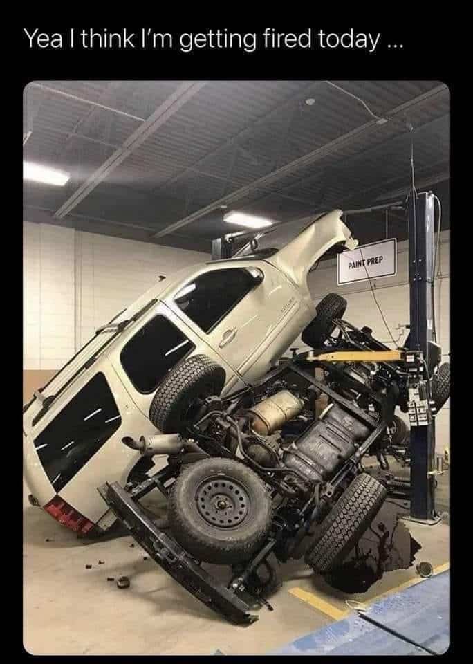 Funny meme showing a white SUV completely separated from its chassis inside an auto shop.