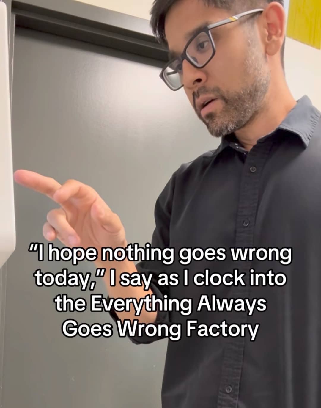 Man looking stressed at a computer with a caption about clocking into a bad factory.