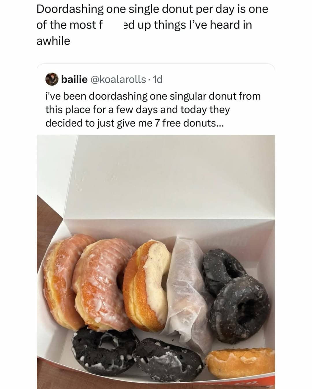 Box of assorted free donuts received after a customer consistently ordered only one single donut via DoorDash.